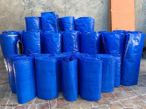 Stock de carpas impermeables azules